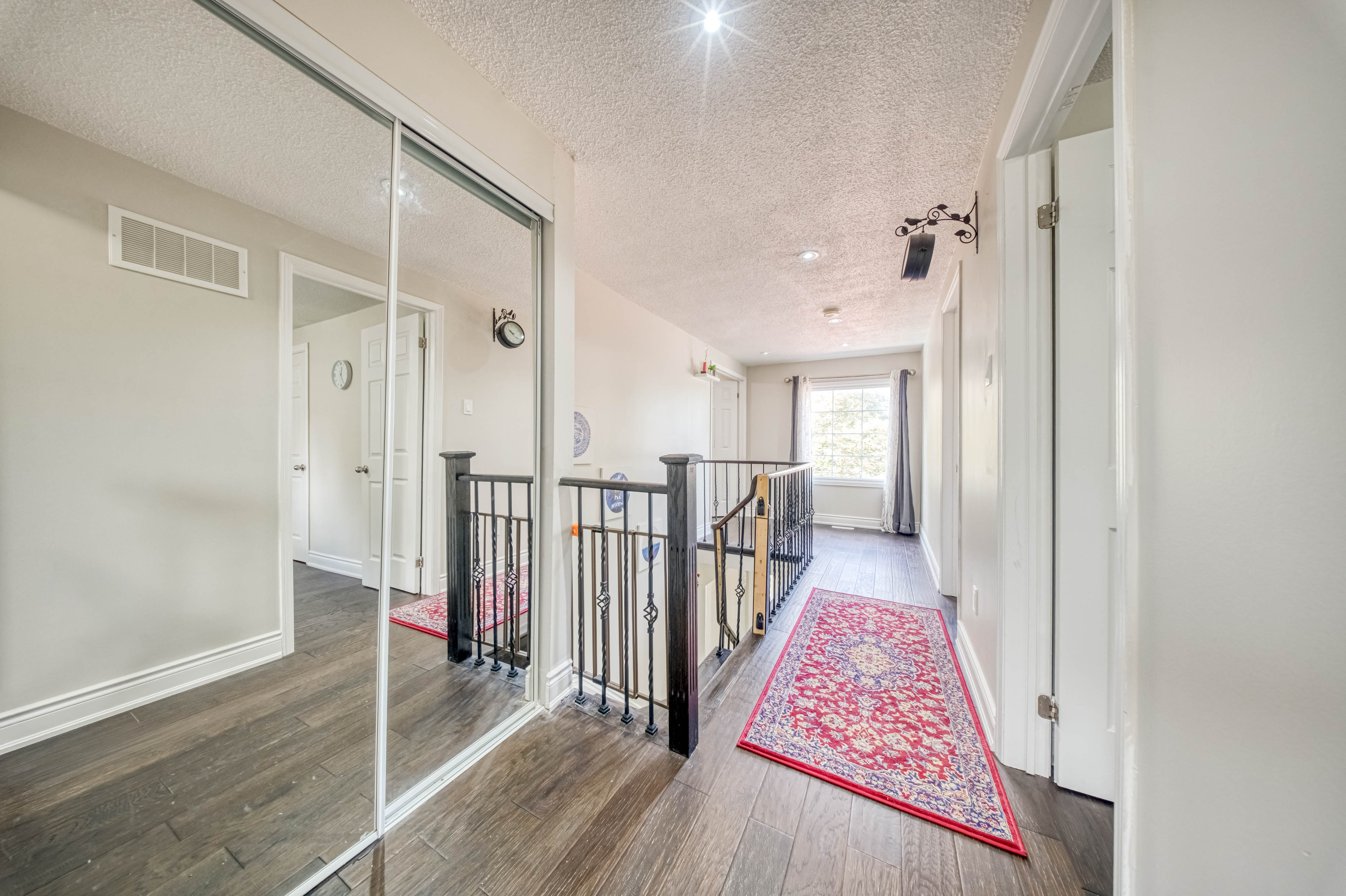 Upper Level Hallway & Mirrored Closet