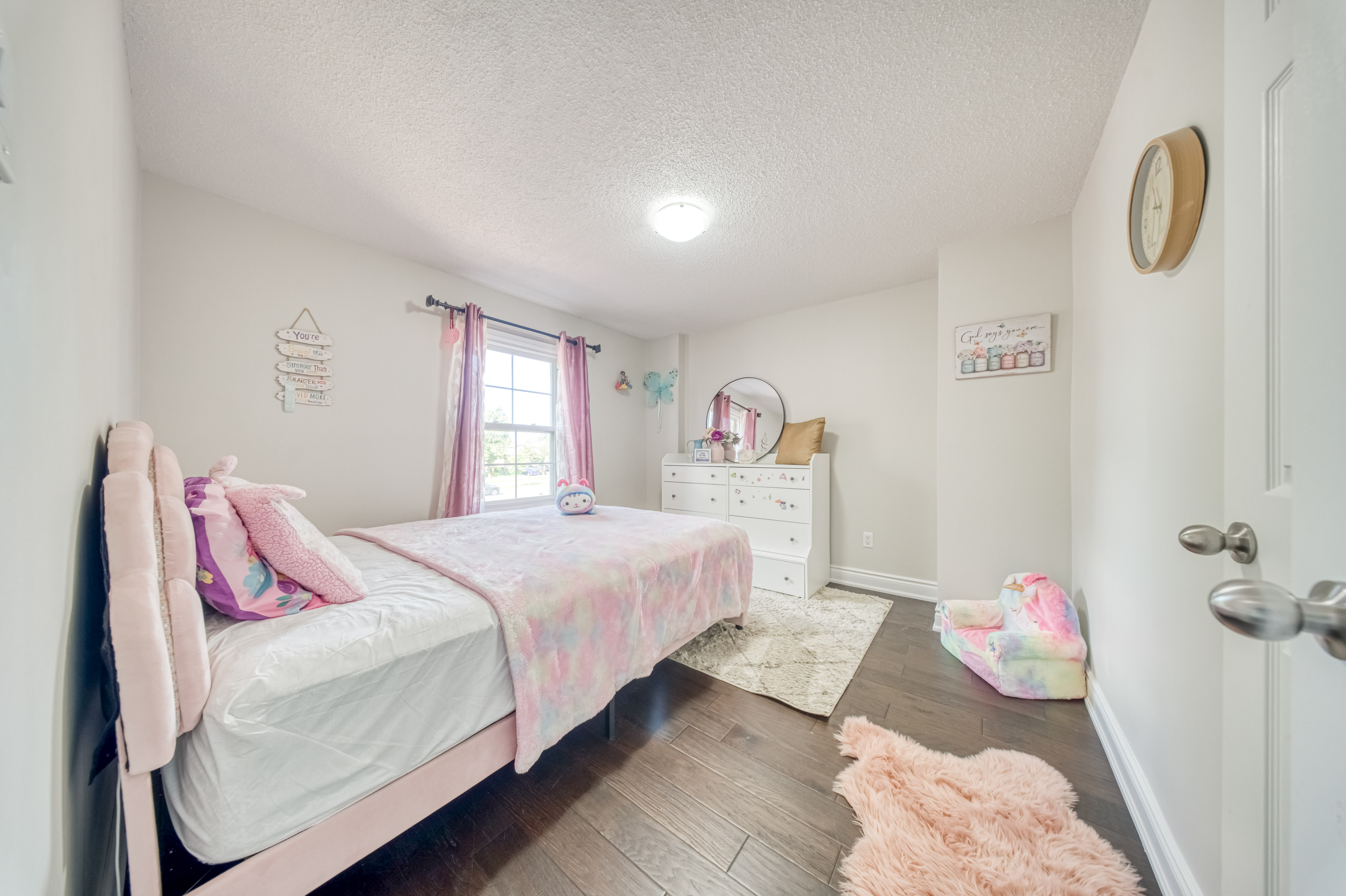 Kids Bedroom with Pink Bed & Decor