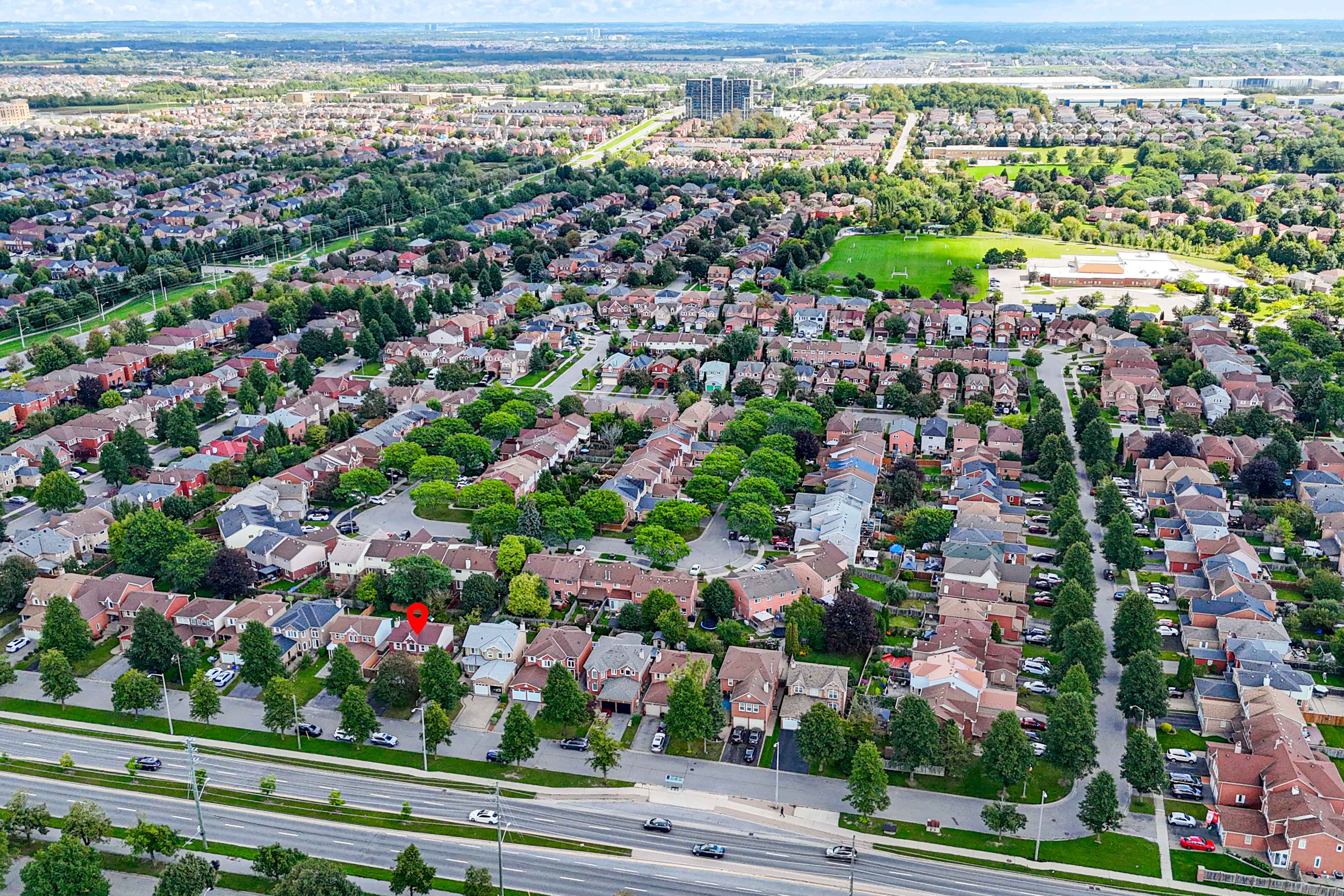 High altitude aerial view of neighborhood